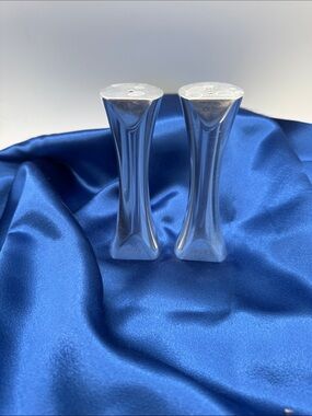 Nambé MCM Tri Corner candlestick holders in a silver metal finish. 5” tall